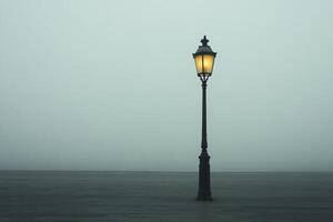 Vintage Street Lamp Illuminating Foggy Urban Environment at Dusk photo