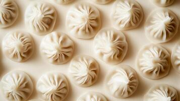 Delicious Dumplings Arranged Neatly on a Light Background Surface photo