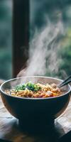 Hot Steamy Bowl of Noodle Soup with Fresh Herbs and Spice Aroma photo