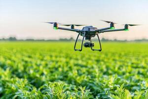 High-tech agricultural field with drone spraying crops while sensors transmit data to farmers laptop photo
