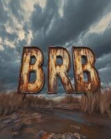 Illustration of BRB in rustic metallic letters on a moody landscape background cloudy weather photo
