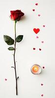 Red Rose, Candle, and Hearts A Romantic Still Life photo