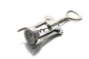 Elegant silver corkscrew tool resting on a clean white surface, perfect for wine lovers and gatherings photo