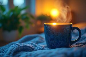 Cozy Winter Evening with Steaming Tea Cup in Warm Indoor Setting photo