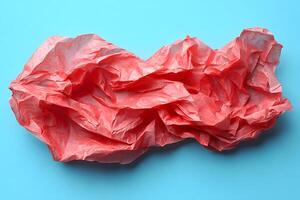 Abstract Red Crumpled Paper on Blue Background for Modern Design Projects photo