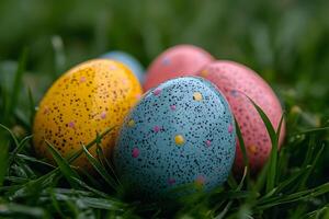 Colorful Easter Eggs in Grass with Bright Speckled Patterns for Spring Design photo