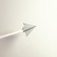 Paper airplane gliding through a smooth, bright space with clean lines and minimalist design elements photo
