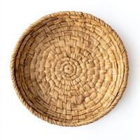 Woven basket crafted from natural fibers showcasing intricate patterns and craftsmanship ideal for home decor photo