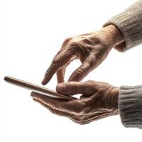 Elderly hands using a smartphone to stay connected in a modern world photo