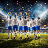 Team celebrates victory with fans in stadium during evening match photo