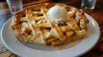 Delicious Apple Pie Served With A Scoop Of Ice Cream photo