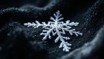 A single crisp snowflake resting gently on dark plush fabric a winter macro detail photo