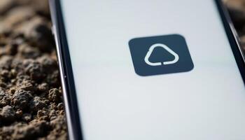 Cloud Storage App Icon Displayed on a Smartphone Screen with a Textured Background photo