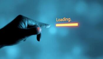 A Hand Gently Guides Progress as the Digital Loading Bar Awaits Completion photo