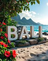 Bali beckons with its stunning coastal landscape and vibrant flora against a mountain backdrop photo