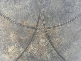 Old plastic texture background, Abstract scratched texture with curved intersecting lines on a distressed plastic surface photo