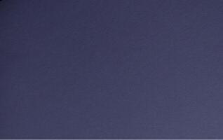 Midnight blue paper background with a smooth, matte surface and subtle grainy texture. Bold dark photo