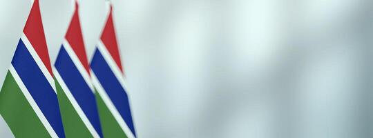 Gambia table flags in the office, banner background with space for text photo