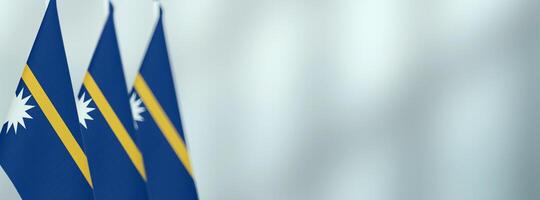 Nauru table flags in the office, banner background with space for text photo