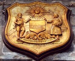 A coat of arms on a building photo