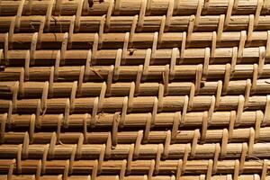 Weave texture or weave pattern background in macro view. Weaves patten classic retro background photo