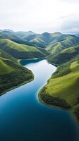 A beautiful mountain range with a river running through it photo