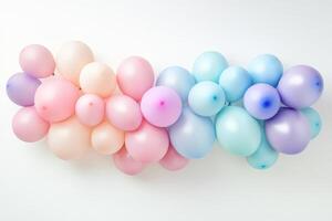 A long line of balloons in a rainbow of colors photo