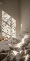 Cozy Sunlit Bedroom with Soft Textiles and Minimalist Decor photo