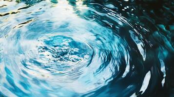A splash of water with ripples in it photo