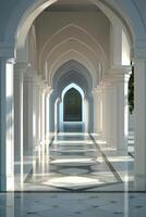 A long hallway with white pillars and a blue archway photo