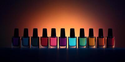 Dark silhouette of nail polish bottles arranged in a neat row with a glowing backdrop. photo