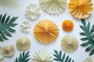 Colorful Paper Art Composition with Circular Patterns and Leaf Shapes on a White Background photo