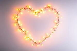 Heart-Shaped String Lights on White Wall Creating a Warm and Cozy Atmosphere photo