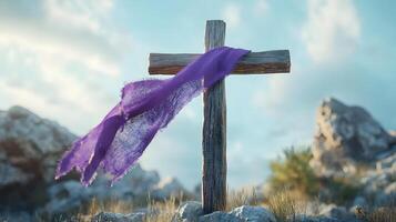 Cross with a purple cloth draped over it photo