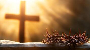Cross is shown with a crown of thorns on top of it photo