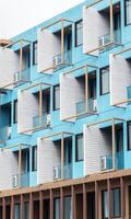 Blue building hotel with pattern window block design photo