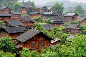 A village in the mountains with wooden houses photo