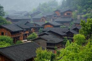 A group of houses in a forest with trees photo