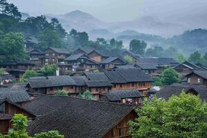 A village in the mountains with many wooden houses photo