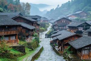 A cobbled street in a village with wooden houses photo