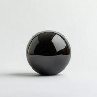 Black sphere, studio shot, white background, reflection photo