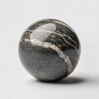 Polished stone sphere, studio shot, white background, decor photo