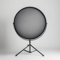 Studio backdrop, circular diffuser, tripod, grey background, photography photo