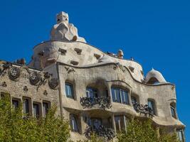 A building with a lot of windows in barcelona photo