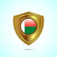 Rounded flag of Madagascar with glossy gold shield vector