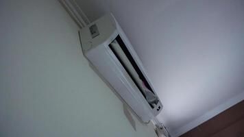 Wall Mounted Air Conditioning Unit with Open Panel photo