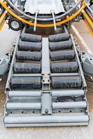 Close up of a hood with tubes, motor vehicle engineering design photo