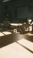 View to classroom with tables and small blackboard and grungy walls video