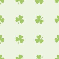Seamless pattern of green clover leaf on light background vector