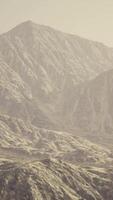 View of the Afghan mountains in fog video